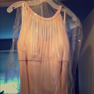 Beautiful, flattering petal pink dress.